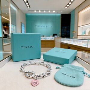 Tiffany & Co. Silver Link Bracelet with Pink Heart Charm and Tiffany Blue Pouch